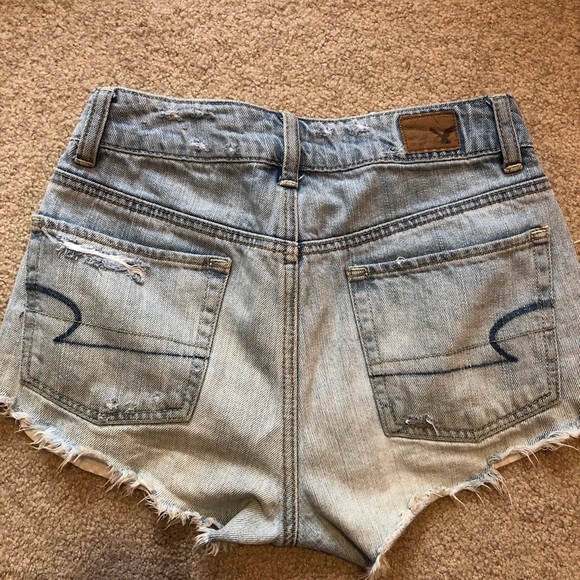 Size 00 American eagle faded blue jean shorts - Picture 2 of 3